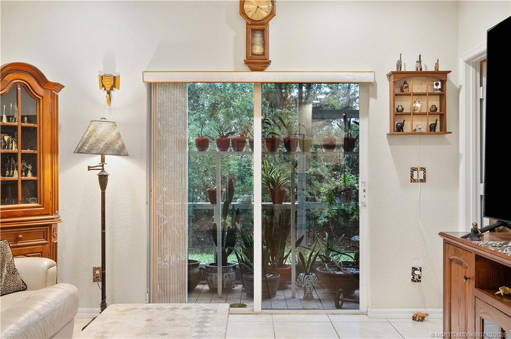 1580 Southeast Sheffield Terrace, Unit 101 Stuart, FL 34994 - Photo 15 of 39 a view of an entryway with livingroom