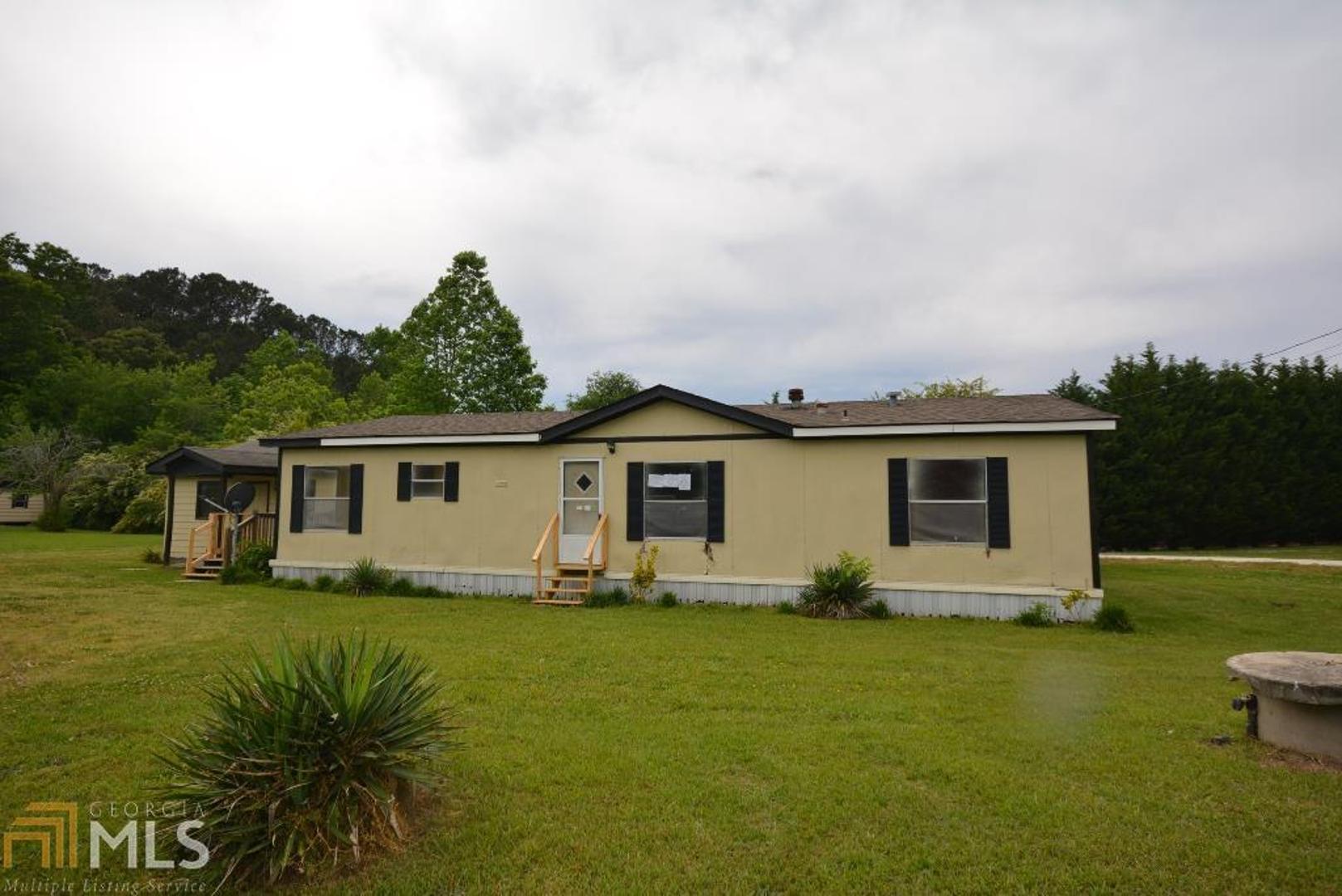 80 Grady Whitton Road Bremen, GA 30110 - Photo 1 of 1 a view of a house with a yard