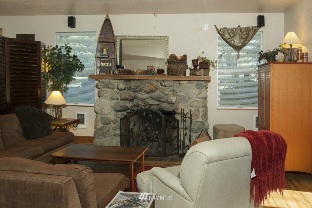 16623 Benson Road South Renton, WA 98055 - Photo 11 of 20 a living room with furniture and a fireplace