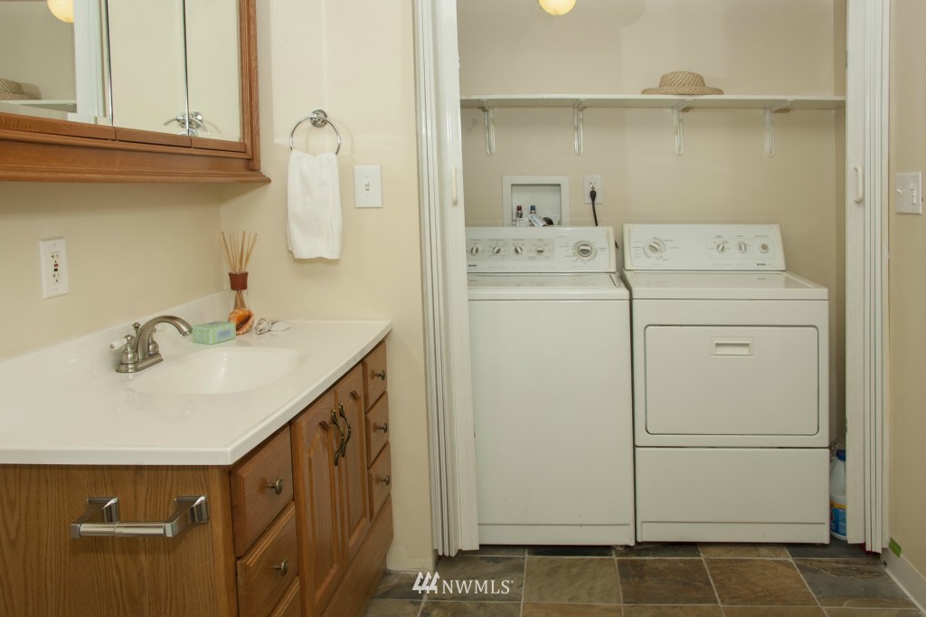 16623 Benson Road South Renton, WA 98055 - Photo 9 of 20 a bathroom with a sink and a mirror