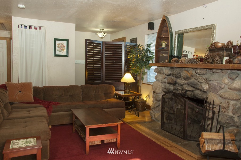 16623 Benson Road South Renton, WA 98055 - Photo 10 of 20 a living room with furniture and wooden floor