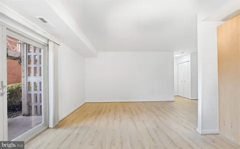 wooden floor in a hall with an entryway