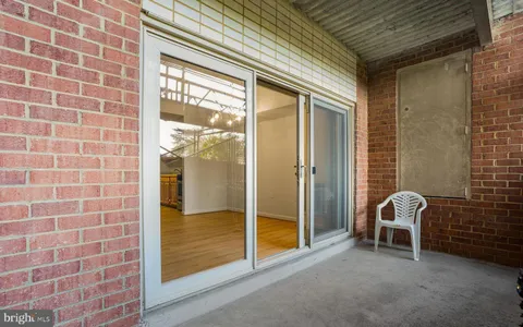 a view of a room with windows