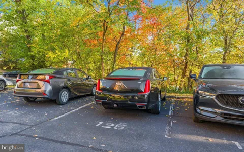 a view of a car parked in a parking lot