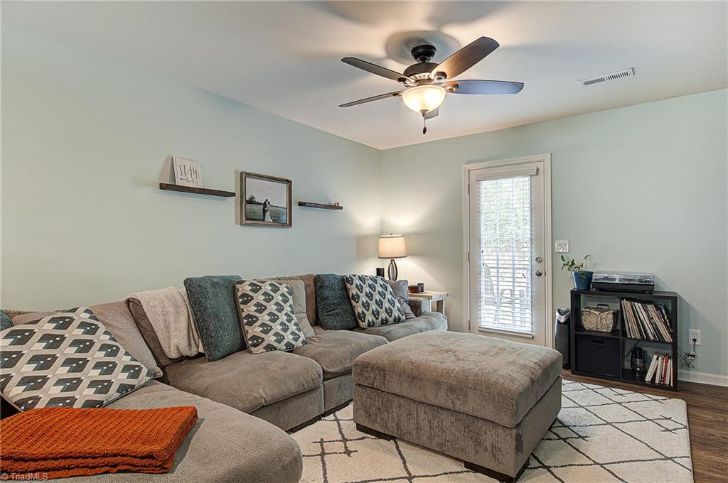 468 Ridgebrooke Drive High Point, NC 27265 - Photo 12 of 29 Spacious living room with door to patio and ceiling fan