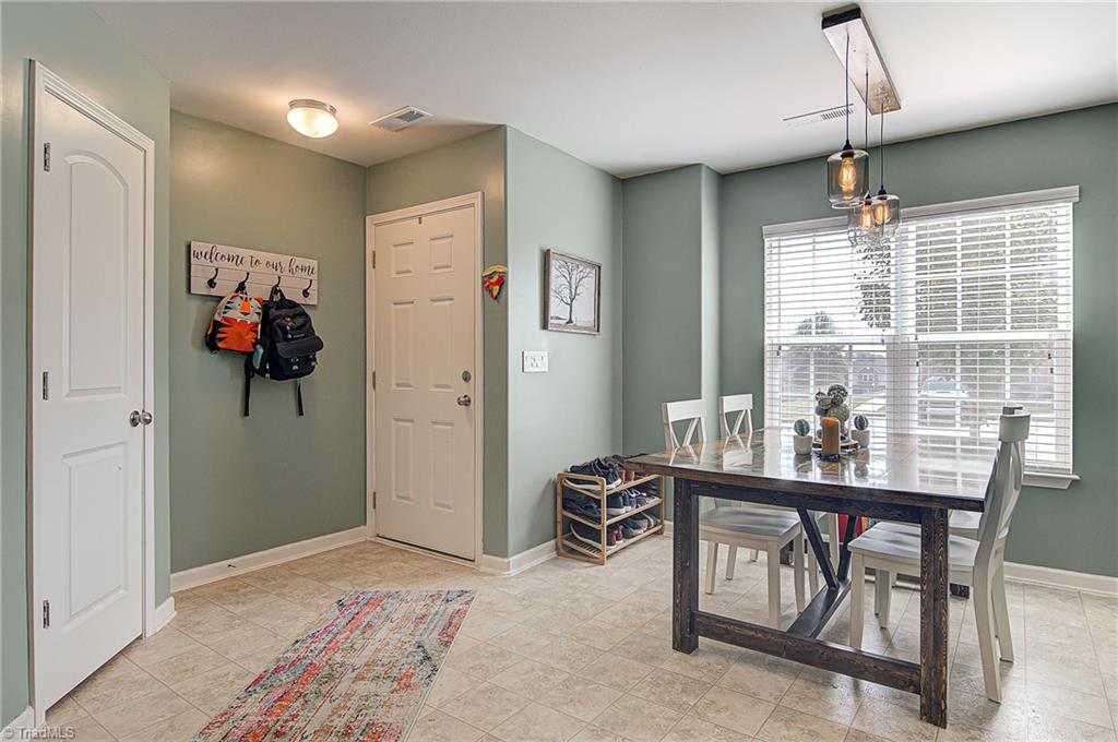 468 Ridgebrooke Drive High Point, NC 27265 - Photo 5 of 29 Enter townhouse into entry and eat in kitchen.