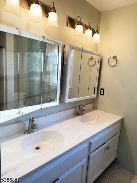 15 Opdyke Road Frenchtown, NJ 08825 - Photo 18 of 27 a bathroom with a sink and a mirror