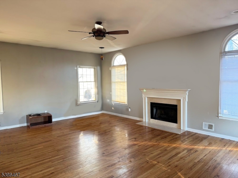 15 Opdyke Road Frenchtown, NJ 08825 - Photo 8 of 27 a view of an empty room with wooden floor fireplace and a window