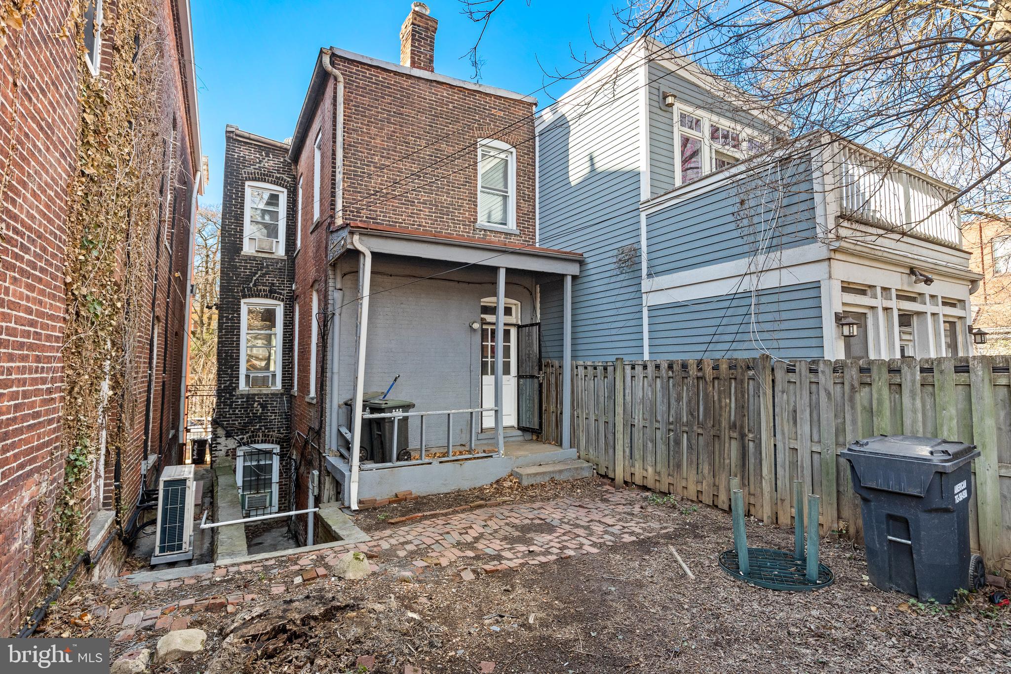 330 4th Street Southeast Washington, DC 20003 - Photo 14 of 14 a view of a house with a yard and wooden fence