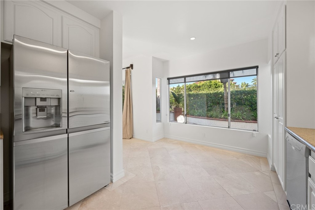 17 St John Dana Point, CA 92629 - Photo 14 of 28 a view of empty room with window and refrigerator