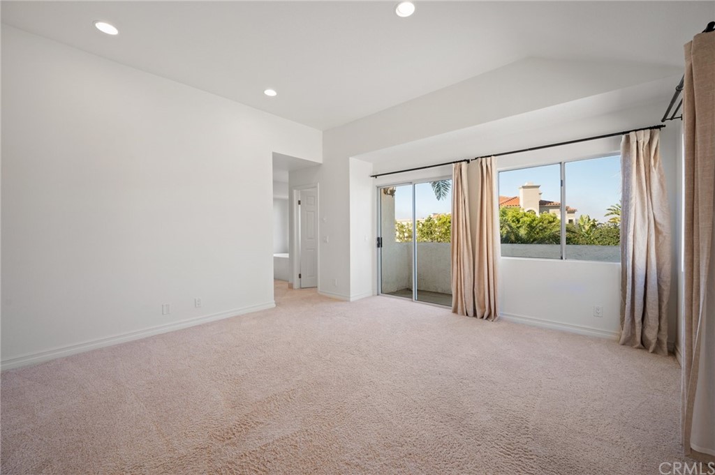 17 St John Dana Point, CA 92629 - Photo 15 of 28 a view of an empty room with a sliding door