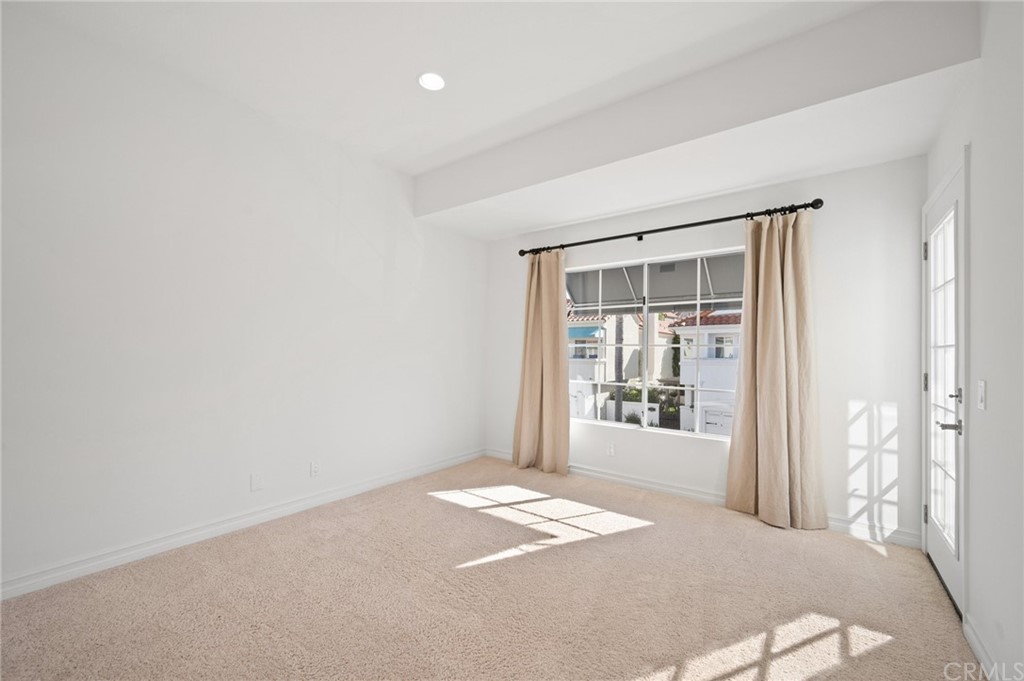 17 St John Dana Point, CA 92629 - Photo 24 of 28 a bedroom with a bed and a window