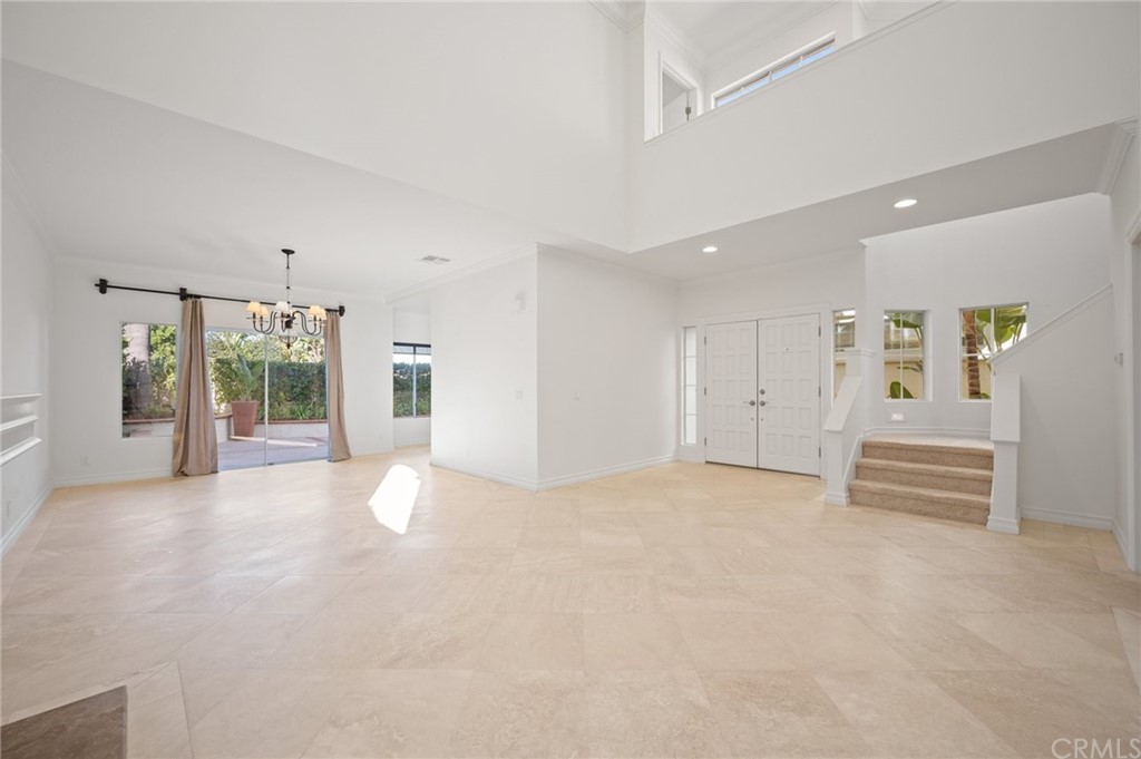 17 St John Dana Point, CA 92629 - Photo 8 of 28 an empty room with entrance and windows