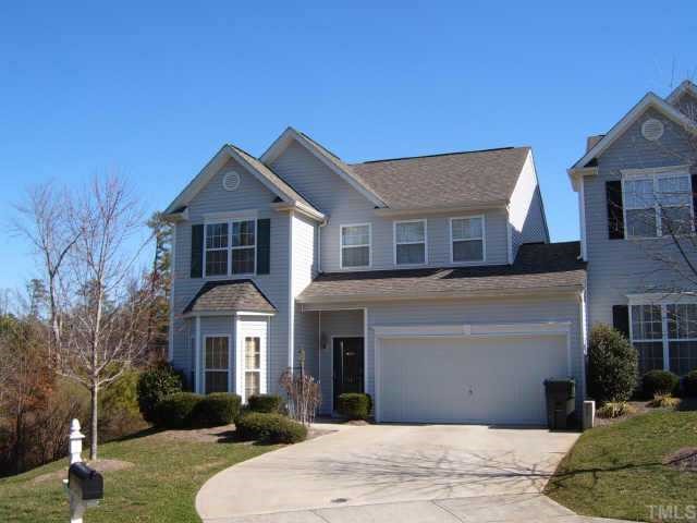 1144 Garnet Ridge Way Raleigh, NC 27607 - Photo 1 of 1 a front view of a house with a yard