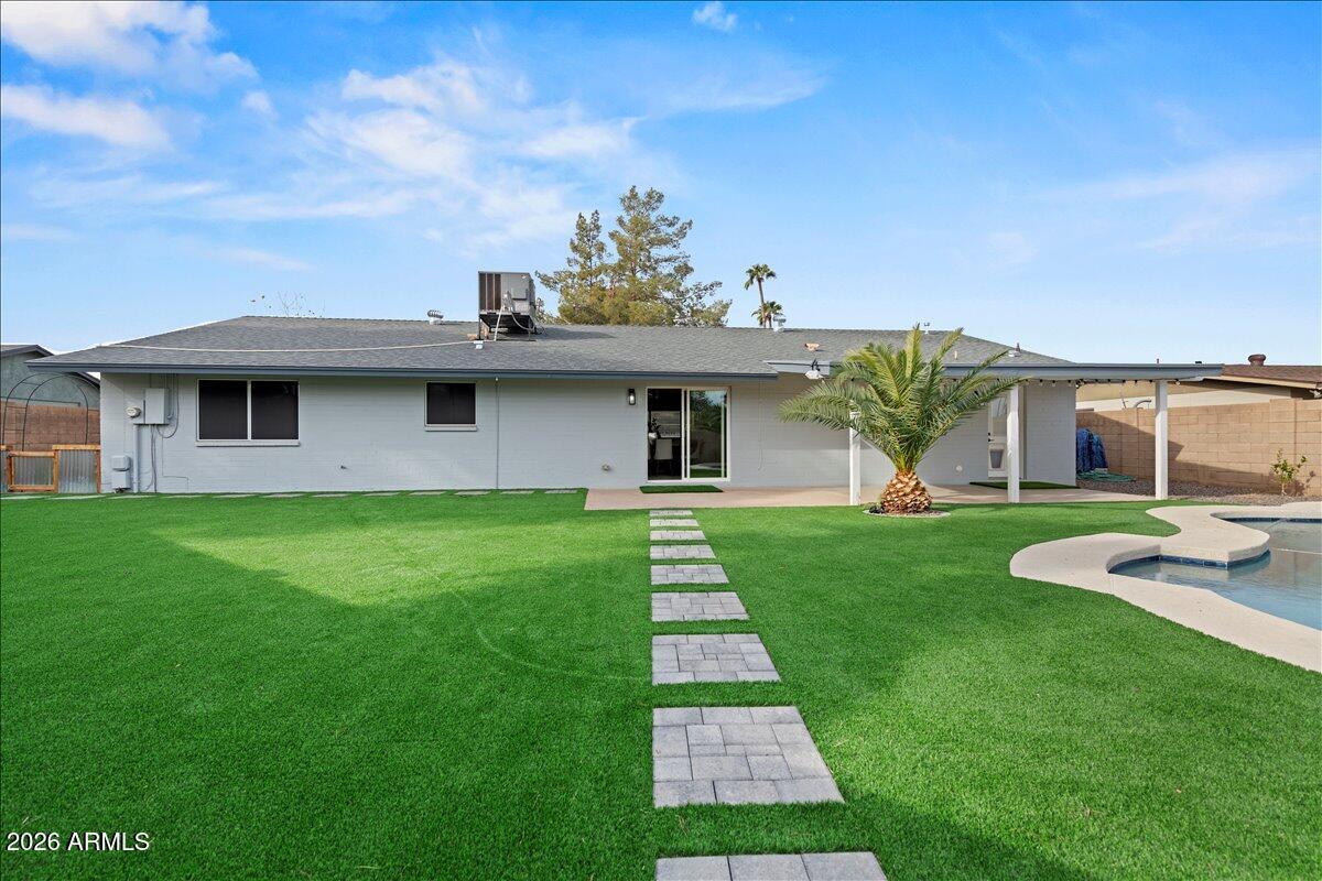 11615 North 30th Street Phoenix, AZ 85028 - Photo 29 of 37 a front view of a house with a yard