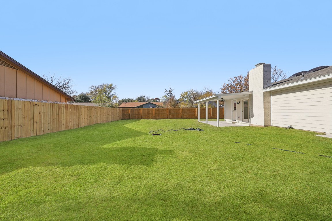 10424 Quail Ridge Drive Austin, TX 78758 - Photo 28 of 37 Fenced backyard with a patio