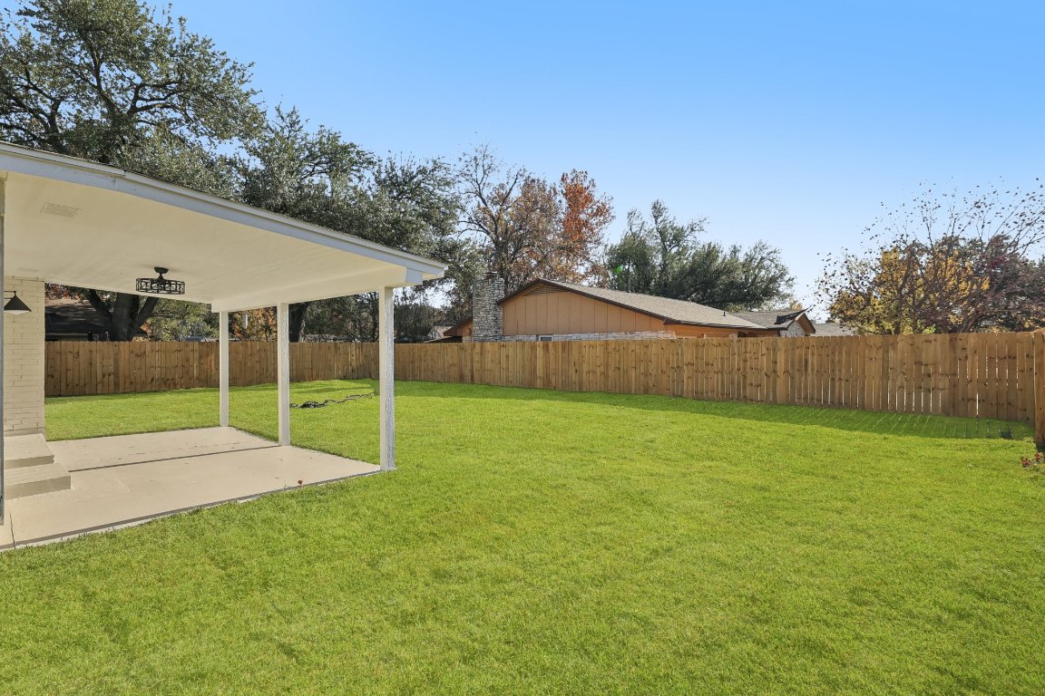 10424 Quail Ridge Drive Austin, TX 78758 - Photo 29 of 37 Fenced backyard with a patio
