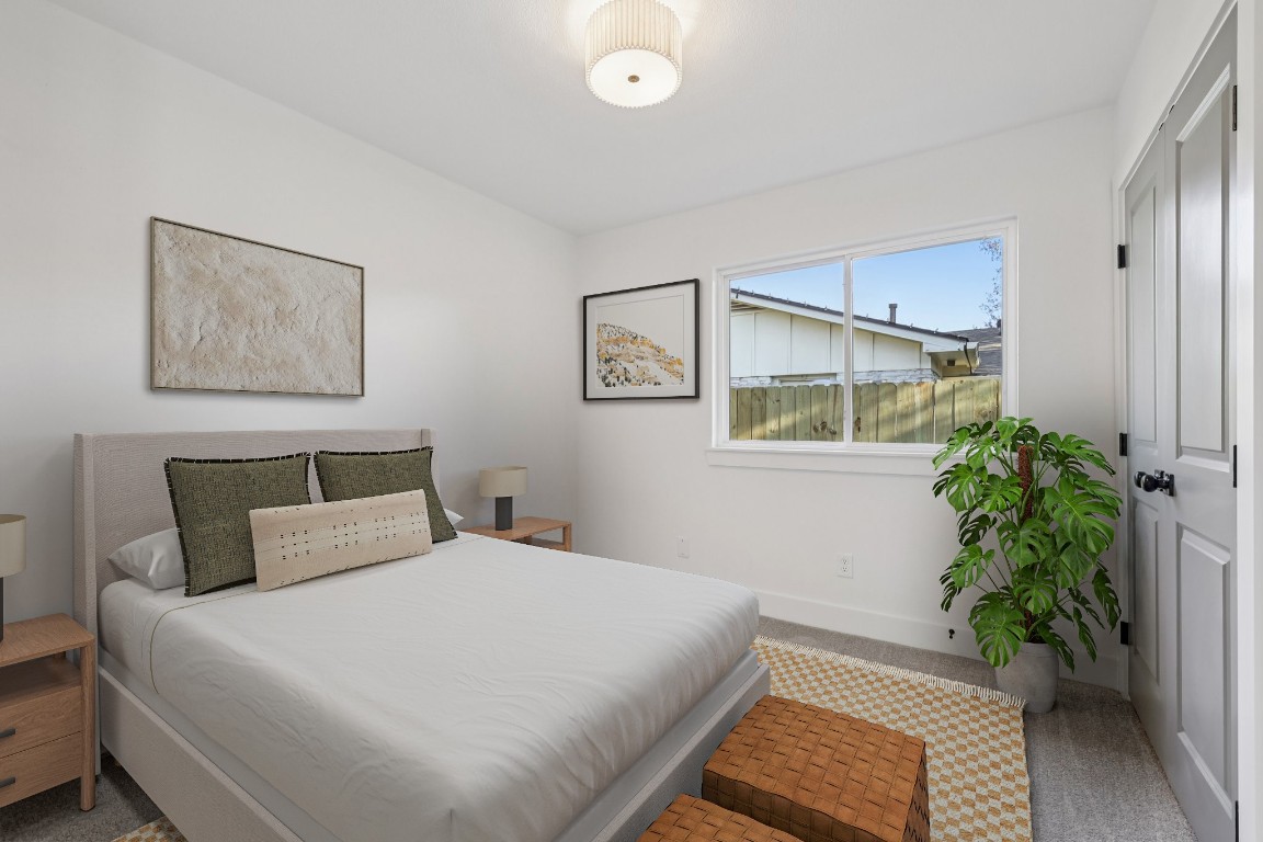 10424 Quail Ridge Drive Austin, TX 78758 - Photo 6 of 37 Bedroom with carpet and a closet