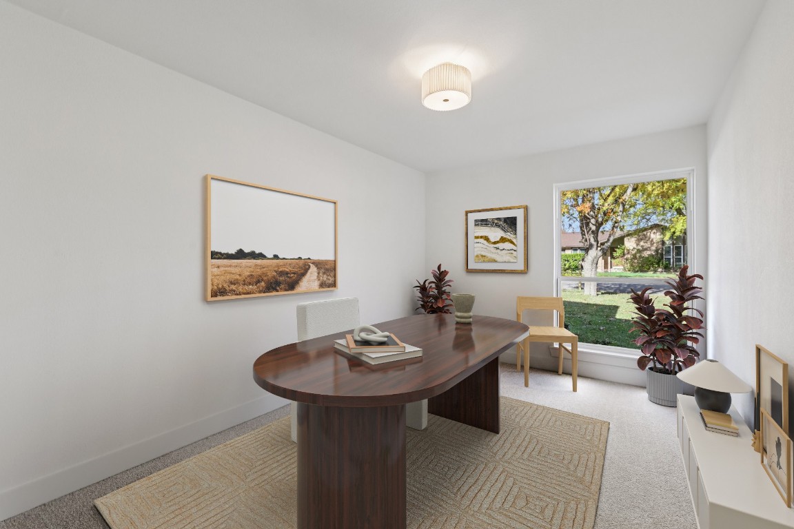 10424 Quail Ridge Drive Austin, TX 78758 - Photo 8 of 37 Office with light carpet and baseboards