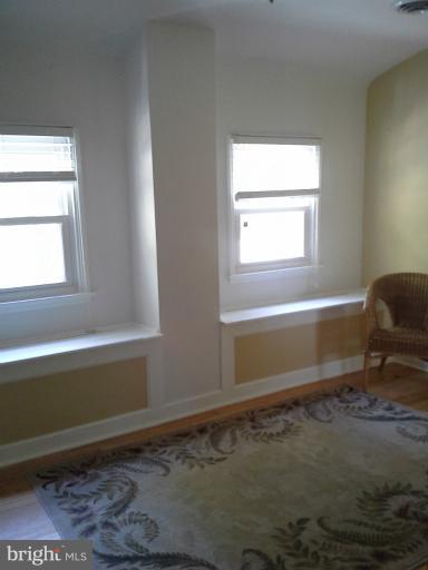 421 Rolling Rd. Catonsville, MD 21228 - Photo 13 of 26 a bathroom with a window and a shower