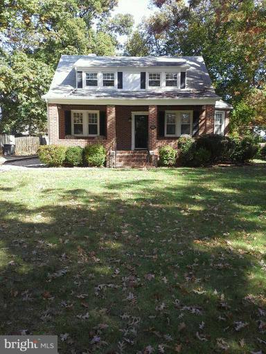 421 Rolling Rd. Catonsville, MD 21228 - Photo 20 of 26 a front view of house with yard and green space