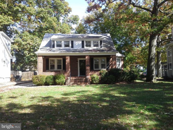421 Rolling Rd. Catonsville, MD 21228 - Photo 3 of 26 a view of a house with a yard