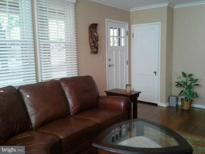 421 Rolling Rd. Catonsville, MD 21228 - Photo 7 of 26 a living room with furniture and a potted plant
