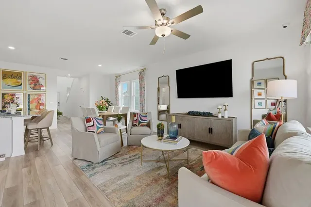 a living room with furniture and a window