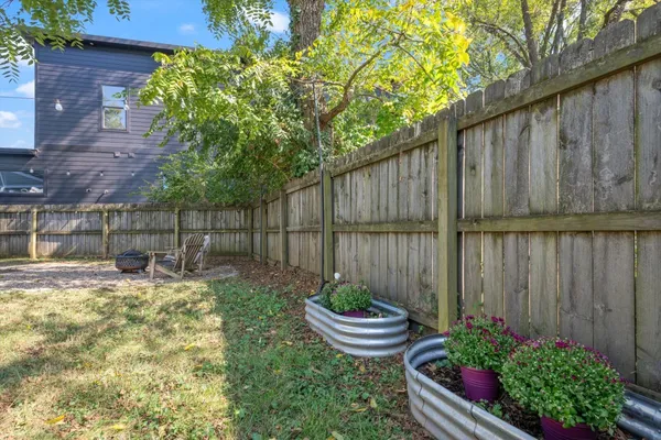 a garden view with a seating space