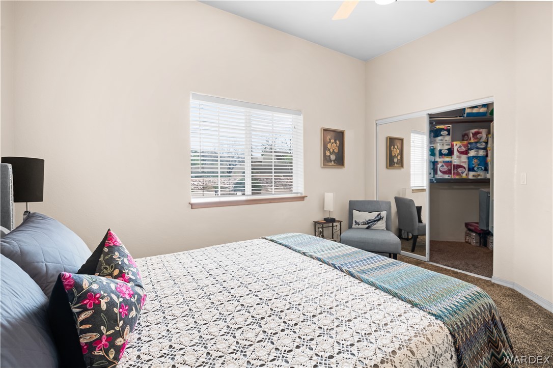 2898 Mountain Trail Road Kingman, AZ 86401 - Photo 22 of 75 a bedroom with a bed and a closet