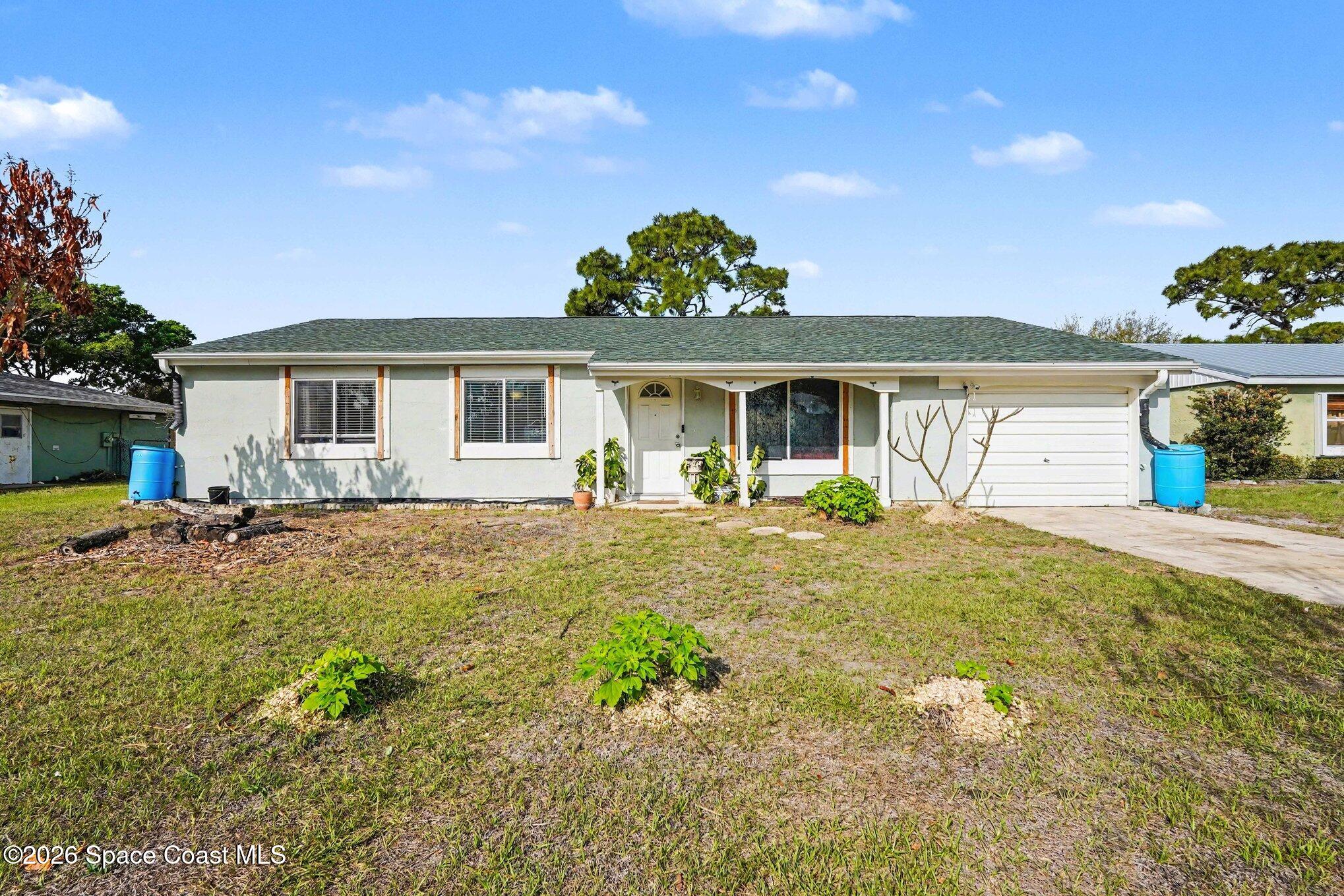 1076 Galty Circle Northeast Palm Bay, FL 32905 - Photo 2 of 31 002_file_9334