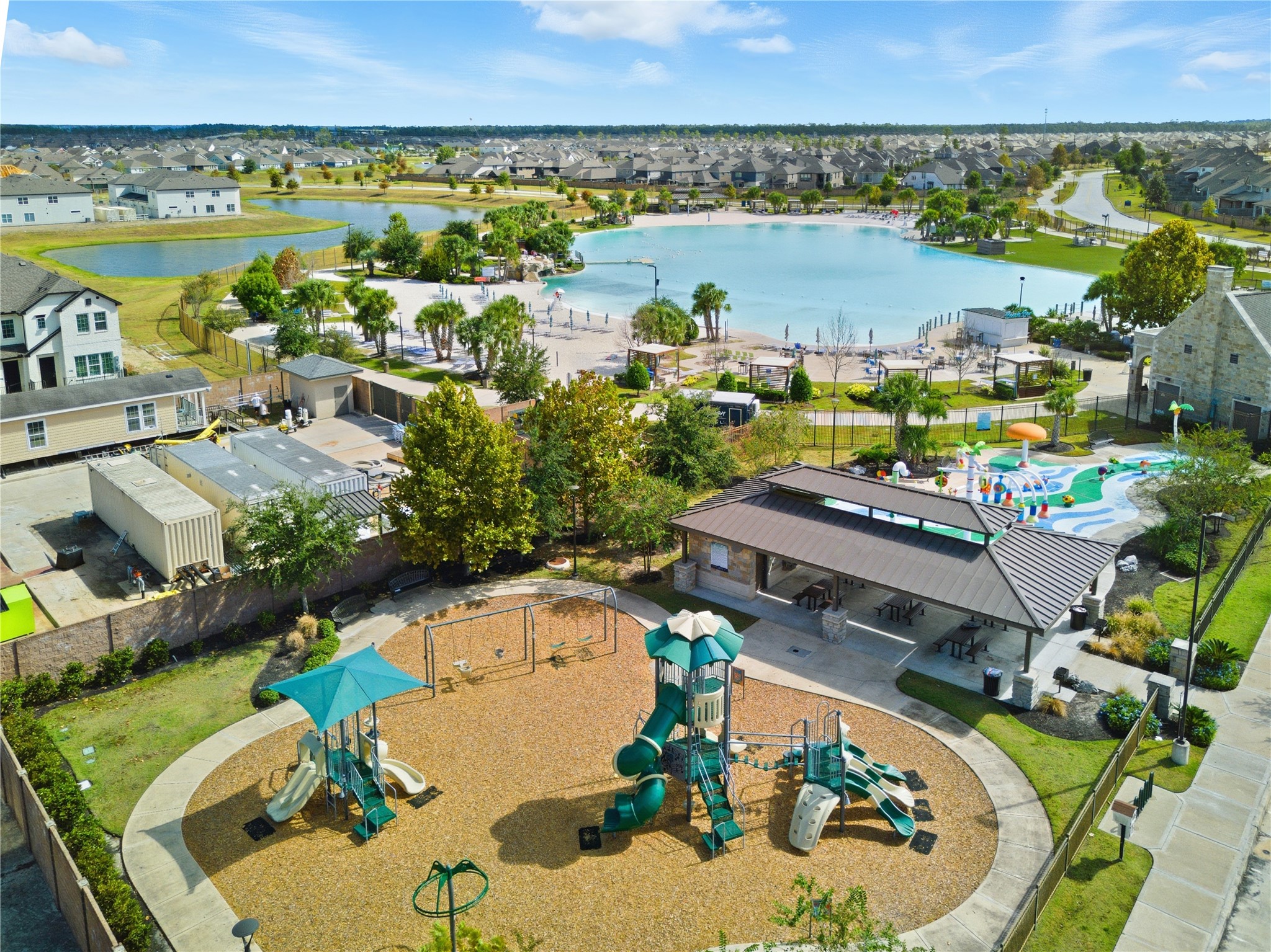 15846 Weston Ridge Drive Humble, TX 77346 - Photo 19 of 22 an aerial view of a house with a lake view