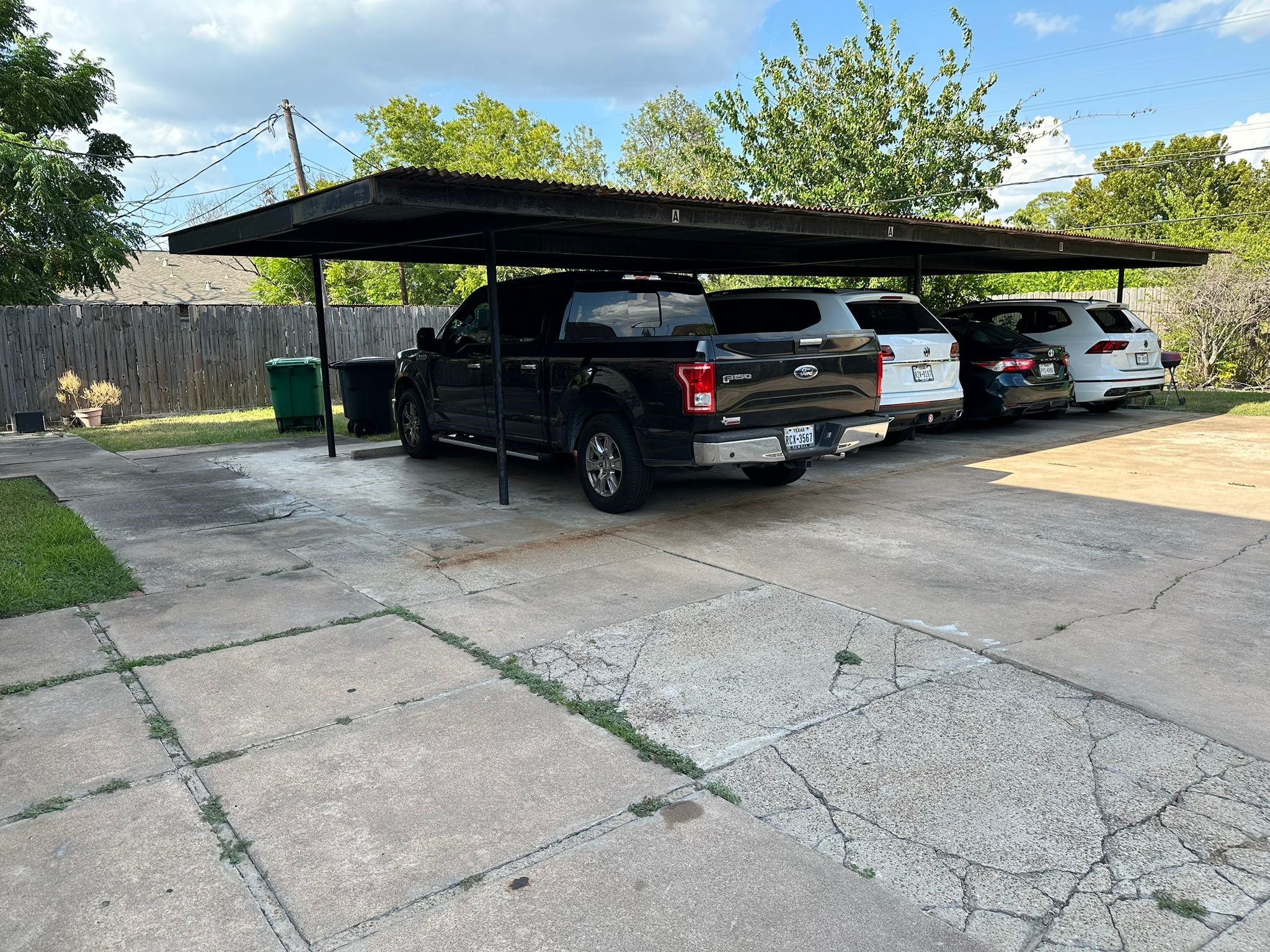 7305 South Gessner Road Houston, TX 77036 - Photo 17 of 24 a view of car parked on the road