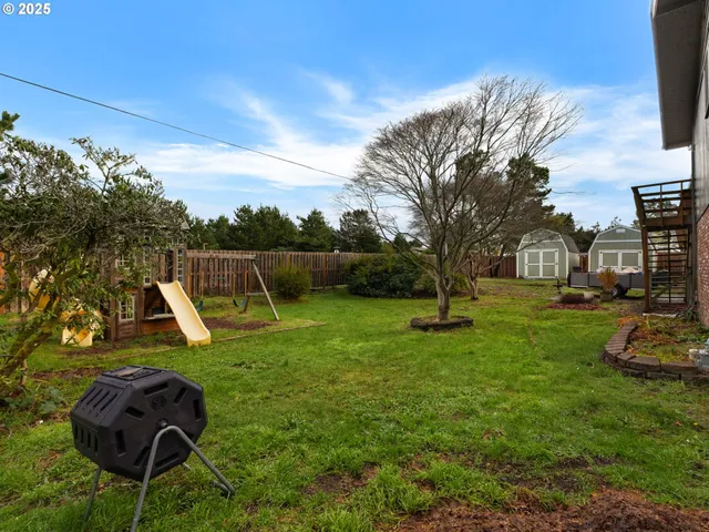 a view of a garden with a slide