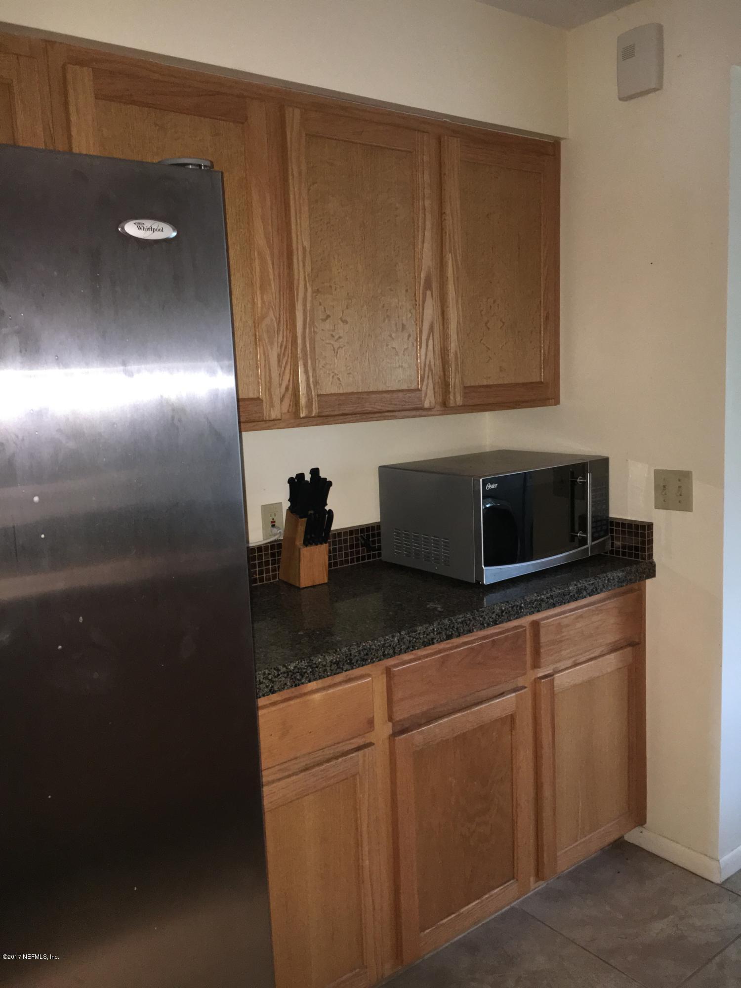 8130 Alderman Road Melrose, FL 32666 - Photo 11 of 36 Kitchen Cabinets