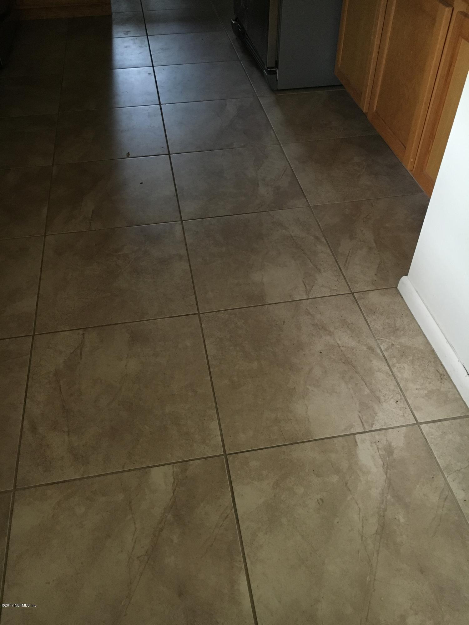 8130 Alderman Road Melrose, FL 32666 - Photo 15 of 36 Close Up View of Kitchen Flooring