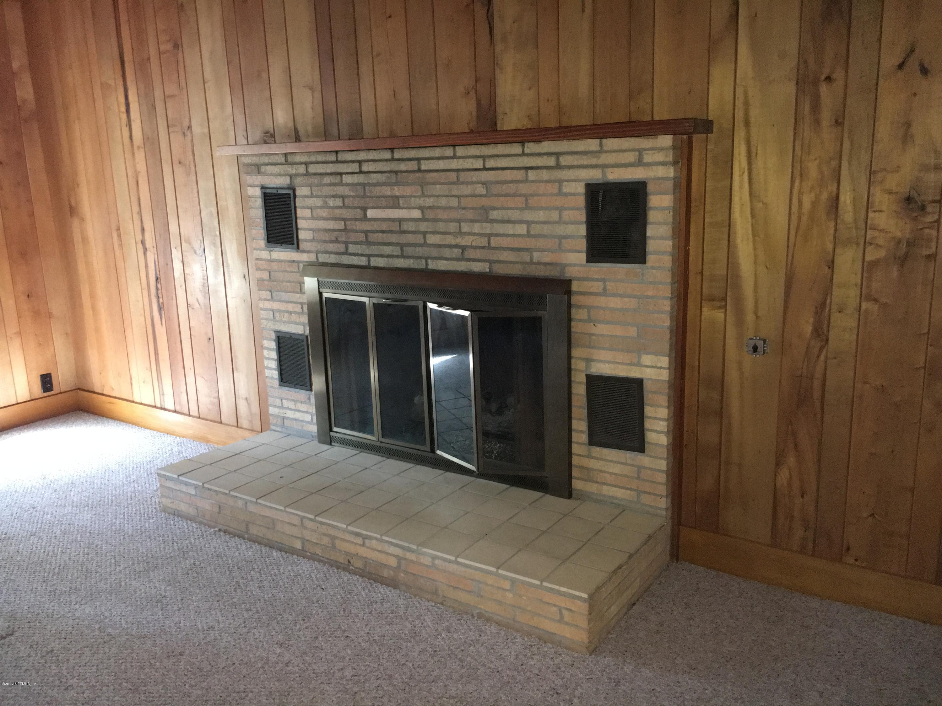 8130 Alderman Road Melrose, FL 32666 - Photo 16 of 36 Close Up View of Fire Place