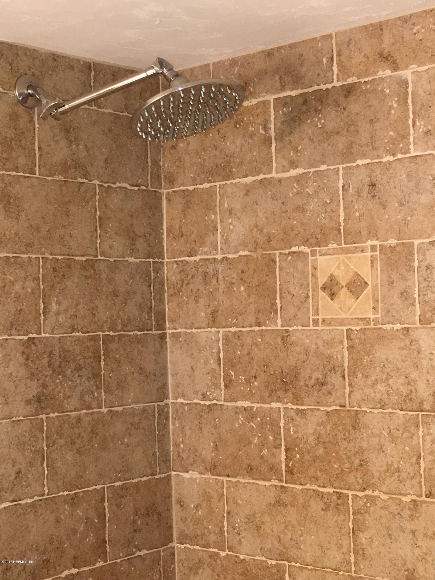 8130 Alderman Road Melrose, FL 32666 - Photo 29 of 36 Close Up of Tile Work