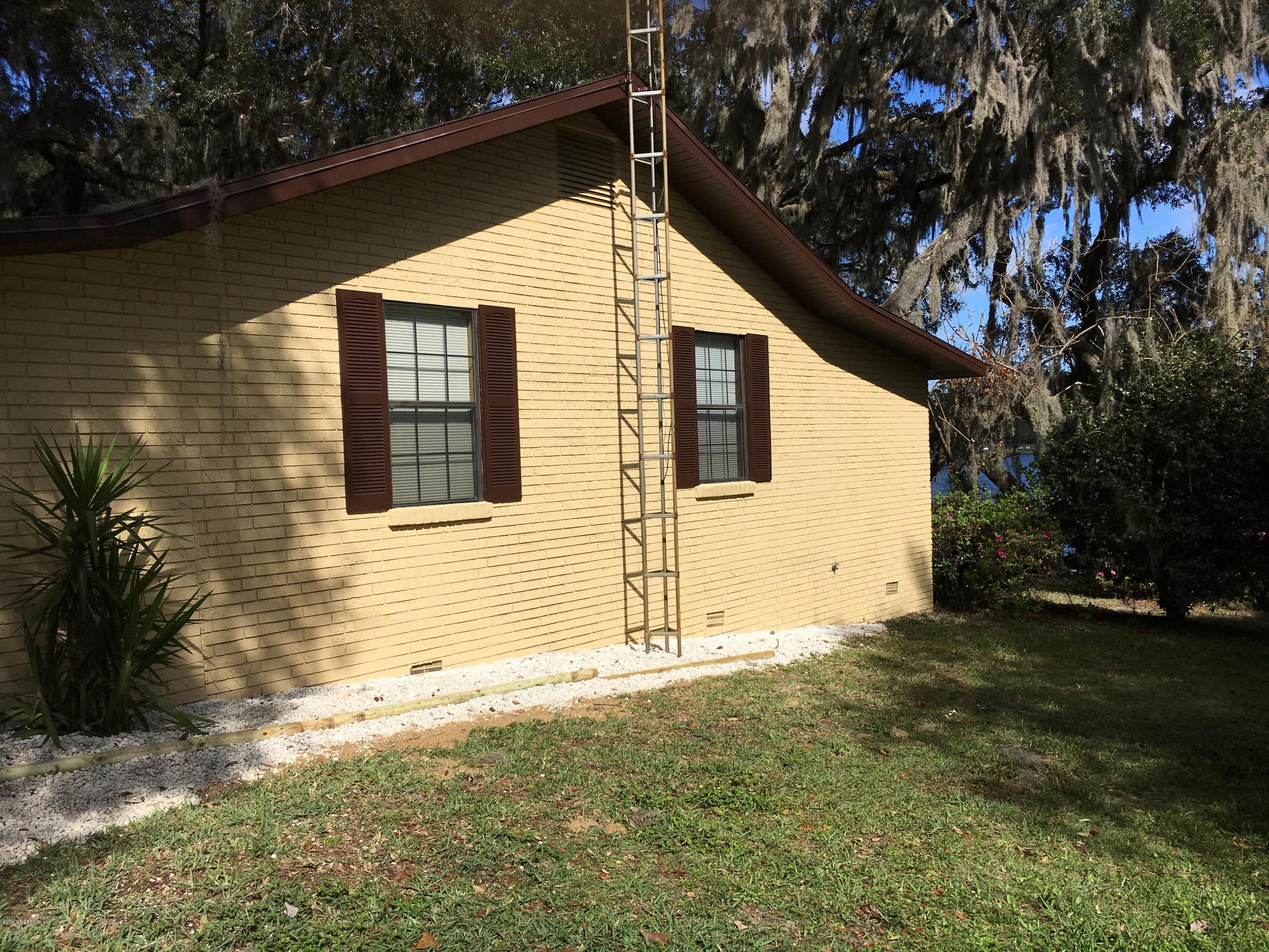8130 Alderman Road Melrose, FL 32666 - Photo 4 of 36 Side View of Home