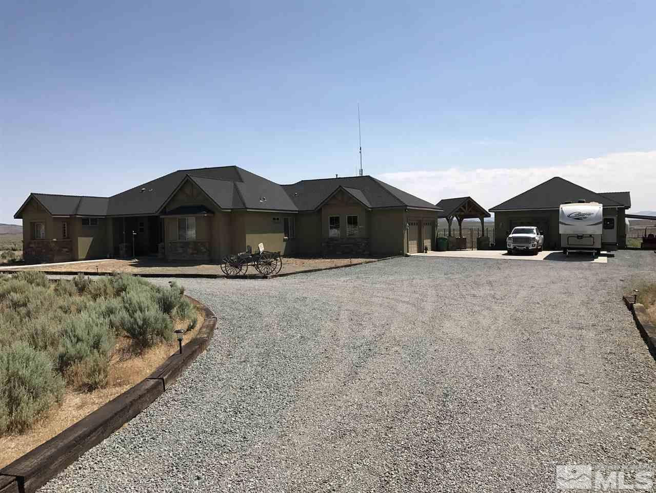 11562 Osage Road Reno, NV 89508 - Photo 1 of 1 a front view of a house with a yard