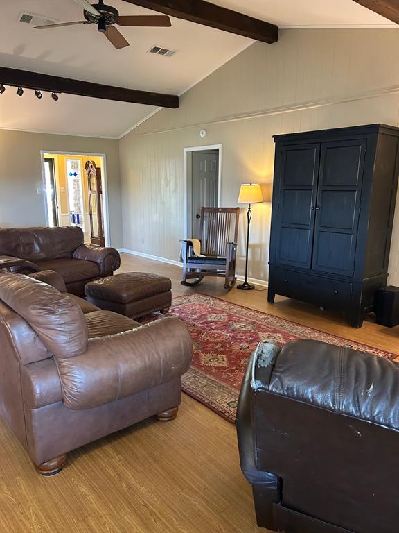 1000 Clark Street Mexia, TX 76667 - Photo 14 of 14 a bedroom with a bed and wooden floor