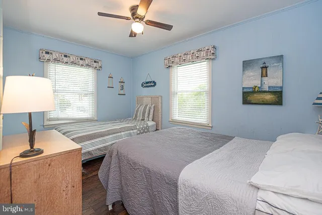 a bedroom with a bed and a view of bathroom