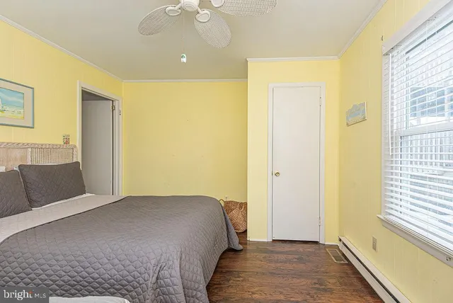 a bathroom with a sink toilet and mirror