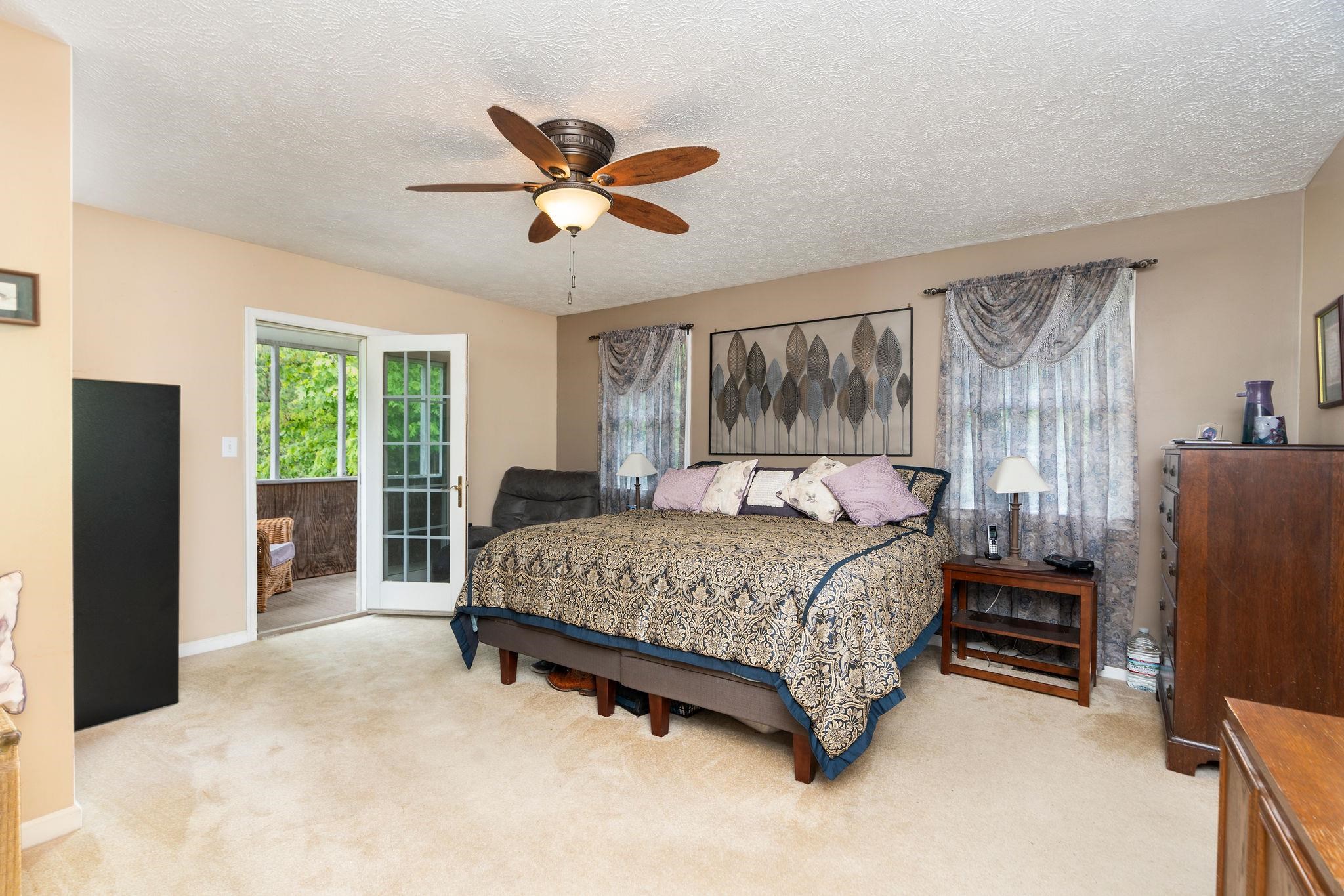 516 Estaline Valley Road Craigsville, VA 24430 - Photo 29 of 75 a bedroom with a bed dresser and a window
