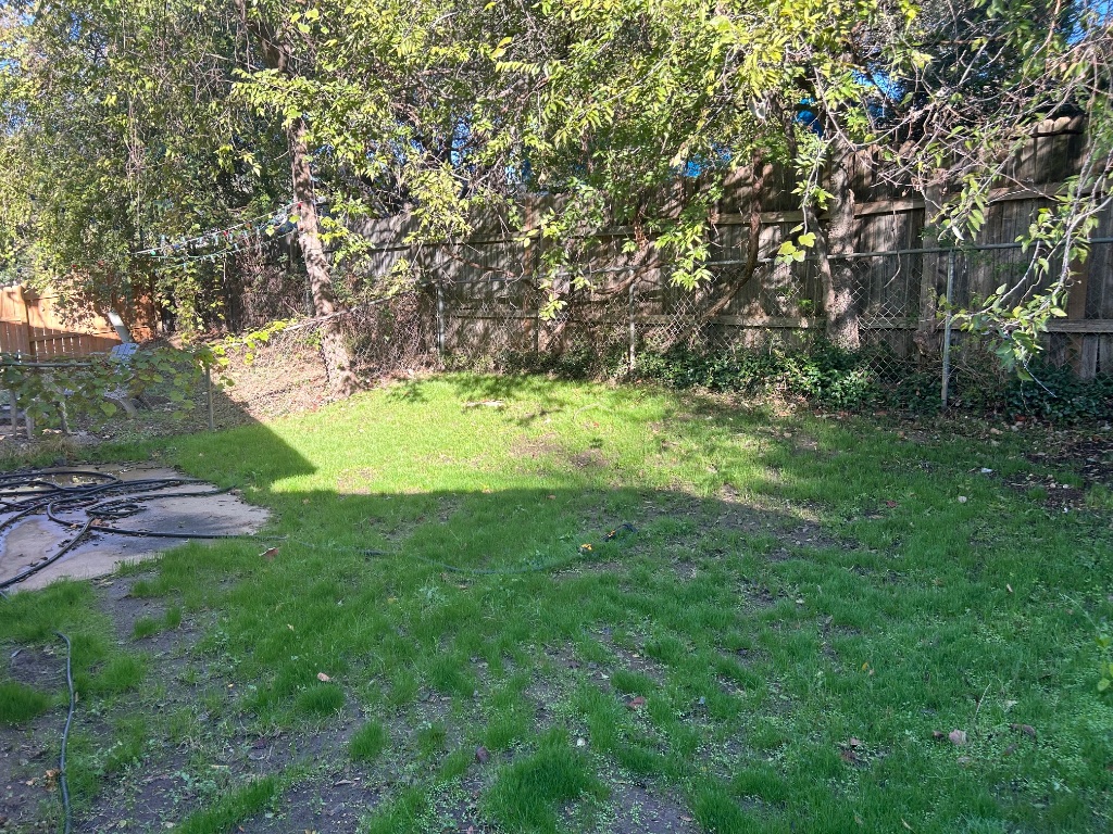 4600 Brown Bark Place, Unit A Austin, TX 78727 - Photo 18 of 18 a big yard with lots of green space and trampoline