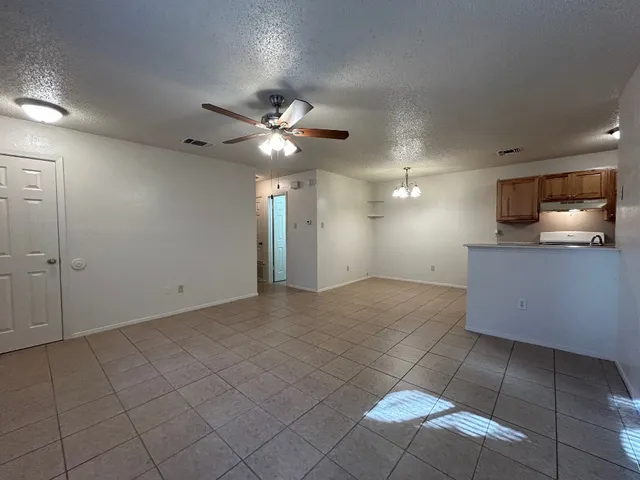 a view of a kitchen with a sink cabinets and window