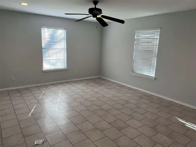 an empty room with windows