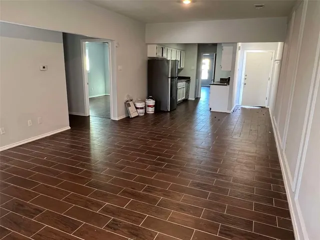a view of a livingroom with wooden floor