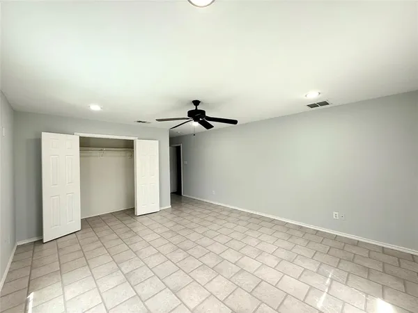 a view of a room with a fan