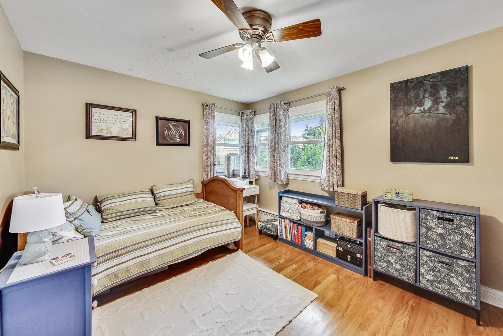 1314 Tyrell Avenue Park Ridge, IL 60068 - Photo 13 of 25 a bedroom with furniture and a window